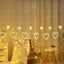 ZYOZ Heart Curtain LED Lights Fairy String Garland for Valentine’s Day, Christmas, Wedding, Party & Home Décor Heart-Shaped Decoration Lights for New Year & Festive Decor, 12 PCS - Multicolor