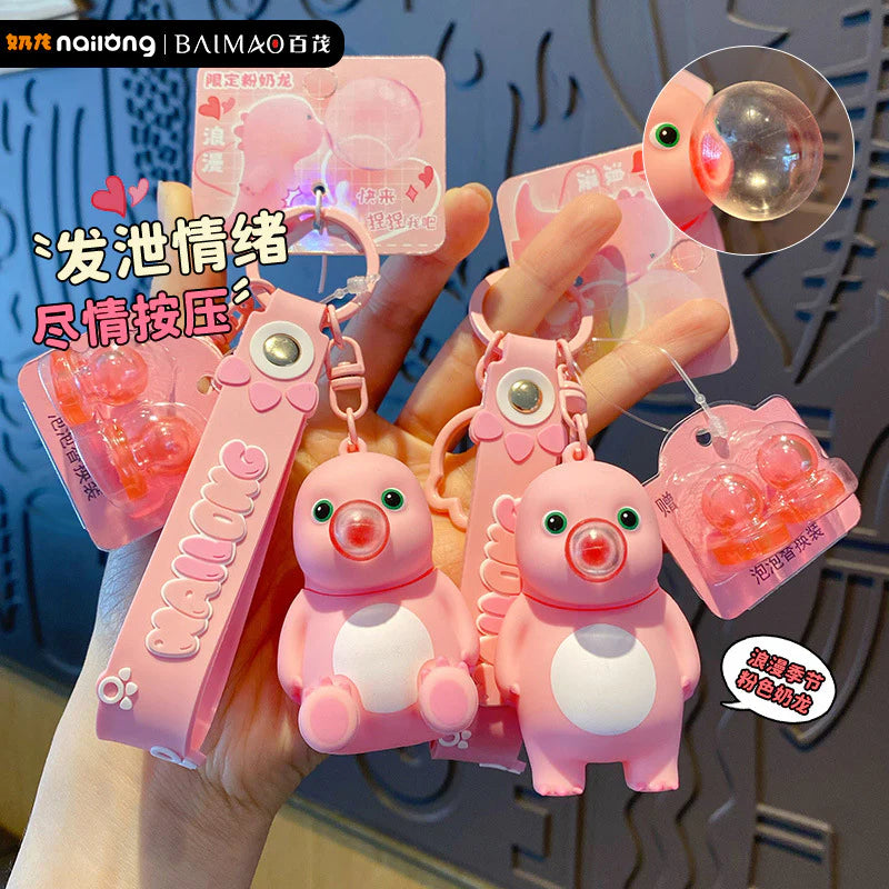 Stress relieving Bubble Blowing Milk Dragon Pink Keychain Cute and Exquisite Doll for Women and Men Stress relieving Toy Bag Pendant Secondary image